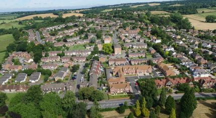 Aerial photo showing buildings and trees.