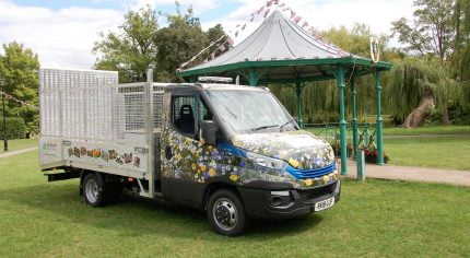 Work van decorated in flowery vinyl.