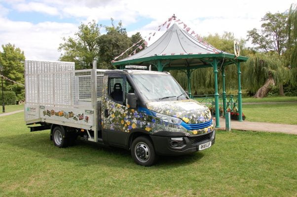 Work van decorated in flowery vinyl.