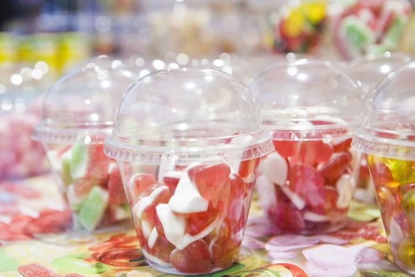 Plastic pots of sweets