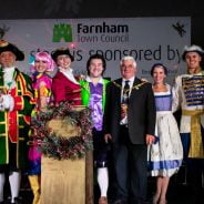 Pantomime cast and Mayor on stage.