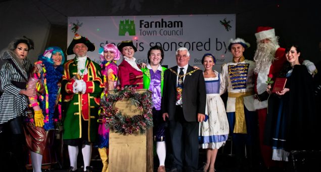 Pantomime cast and Mayor on stage.