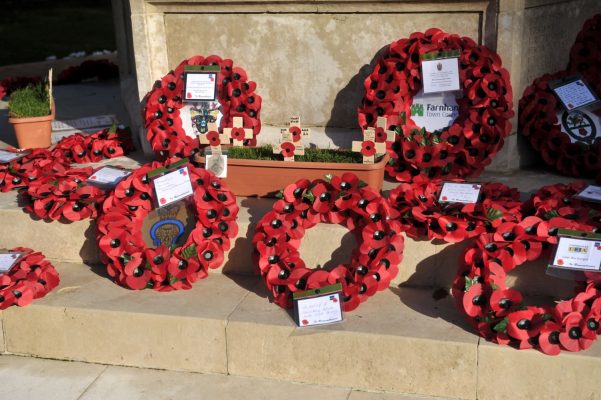 Poppy wreaths at a war memorial