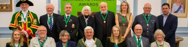 Group of people wearing medals