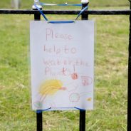 A4 poster drawn by a child saying Please help to water the plants.