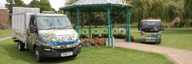 Two vans parked either side of bandstand