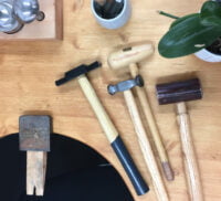 Various hand tools on a table top