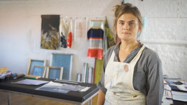 Female artist in her studio