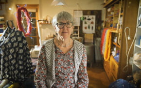 Female is a studio surrounded by knitting and wool