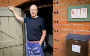 Male standing in a doorway
