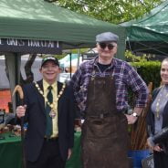 Mayor and Mayoress standing next to a man