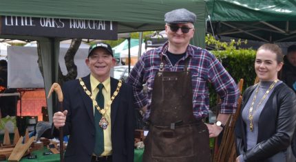 Mayor and Mayoress standing next to a man