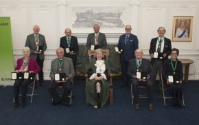 Group of people with Mayor front centre.