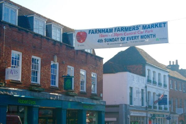 Downing Street and a cross street banner advertising Farnham Farmers' Markets