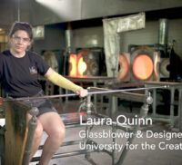 Female glassblower in a studio