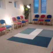 Room with chairs around the outside