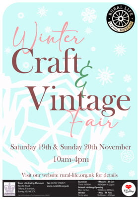 Winter Craft Vintage Fair poster featuring white snowflakes on a blue background