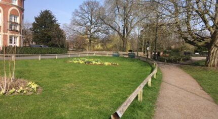 Small grass area with footpath alongside.