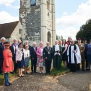 Group of people in front of a church