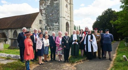 Group of people in front of a church