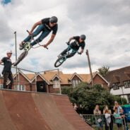 Two stunt bike riders on a ramp