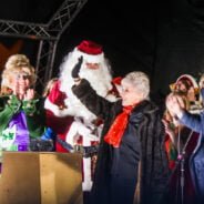 Pantomime characters, Father Christmas and a female waving