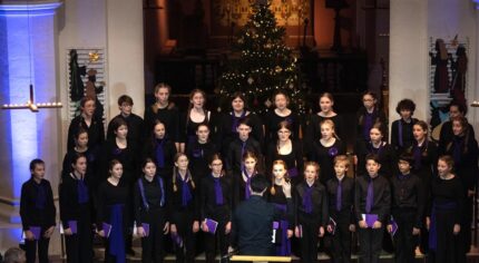 Choir of young people in a church.