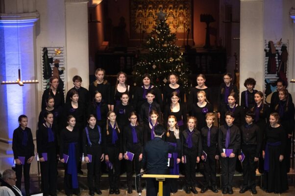 Choir of young people in a church.