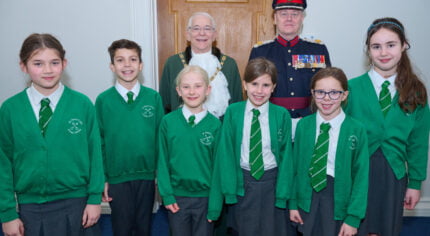 Group of schoolchildren with the Mayor and Deputy Lieutenant