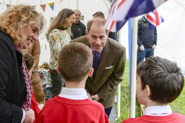 HRH The Duke of Edinburgh talking to school children.