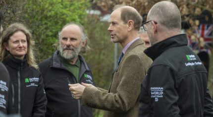 HRH The Duke of Edinburgh talking to a small group of people