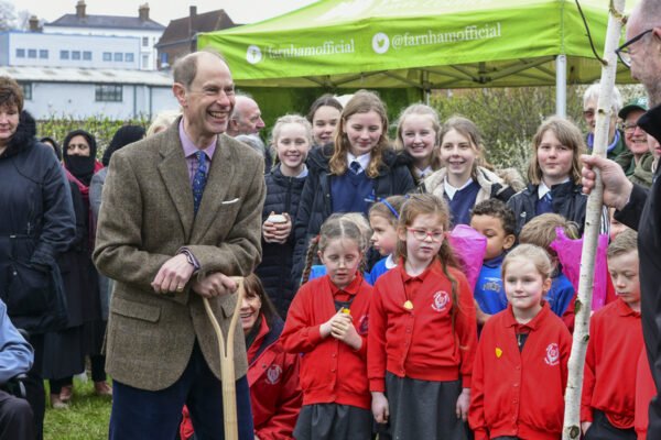 HRH The Duke of Edinburgh with a group of school children