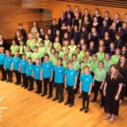 A photo of Farnham Youth Choir standing in formation.