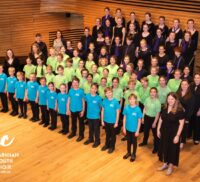 A photo of Farnham Youth Choir standing in formation.