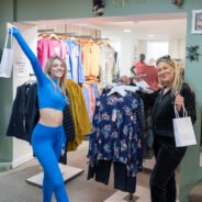 Two females in a clothes shop.