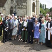 Group of people outside a church.