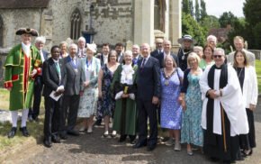 Group of people outside a church.