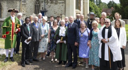 Group of people outside a church.