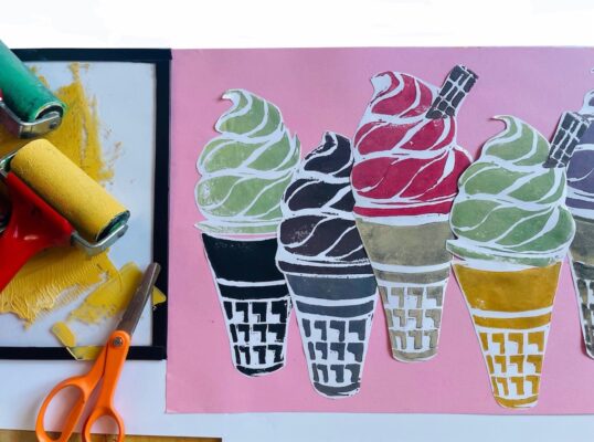 A picture of printed ice cream cones in multiple colours and paint rollers
