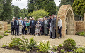 Group of people in a garden.