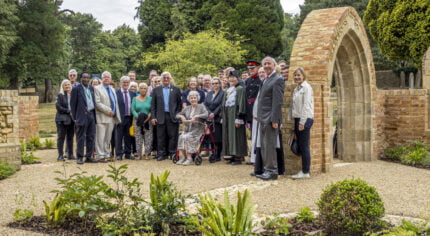 Group of people in a garden.