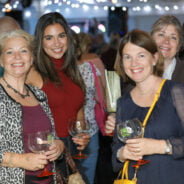 Group of four females enjoying a gin cocktail.