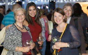 Group of four females enjoying a gin cocktail.