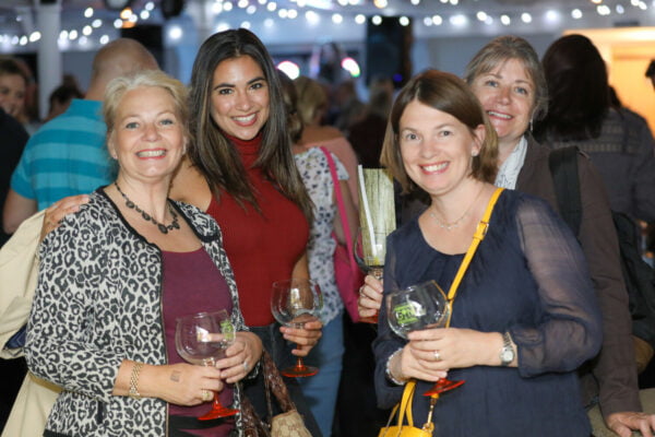 Group of four females enjoying a gin cocktail.