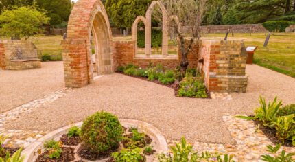 Garden set amidst chapel ruins.