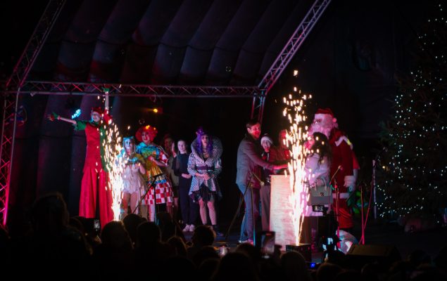 People on stage at Christmas lights switch-on