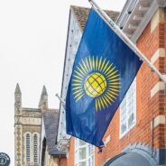 Commonwealth flag on side of building.