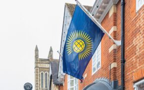 Commonwealth flag on side of building.