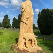 Animals carved from a tree trunk.