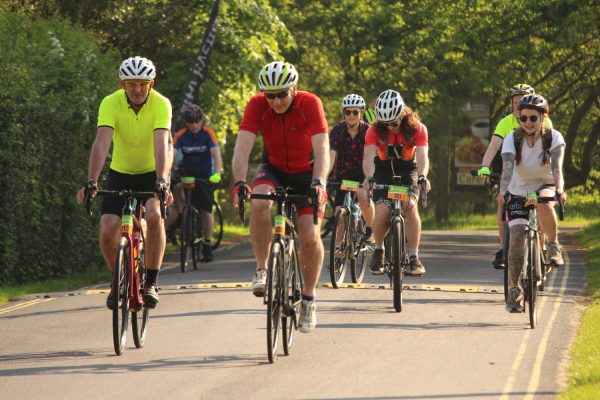 A group of people cycling